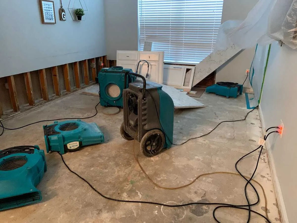 Dehumidifier in flood-cut room for Water Damage Restoration in West Deer